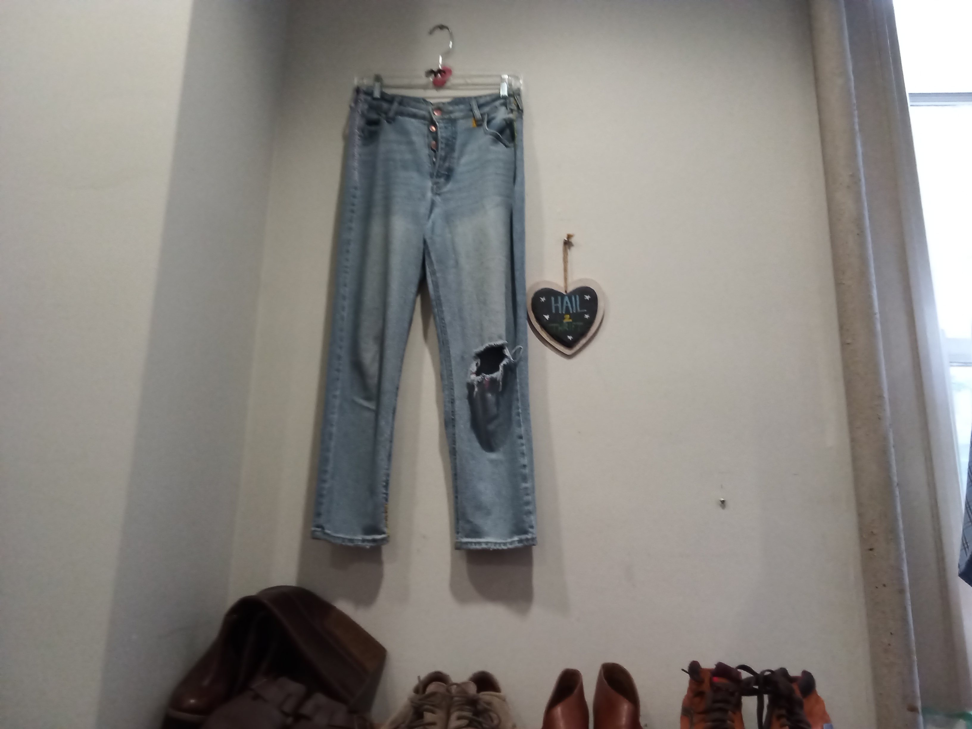 Photo of a thrift store.The trift store provides a cheap way to buy and reuse clothes.